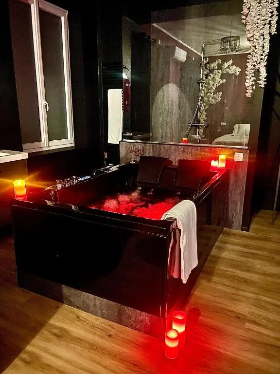 Suite romantique avec balnéo et jeux coquins – escapade sensuelle
